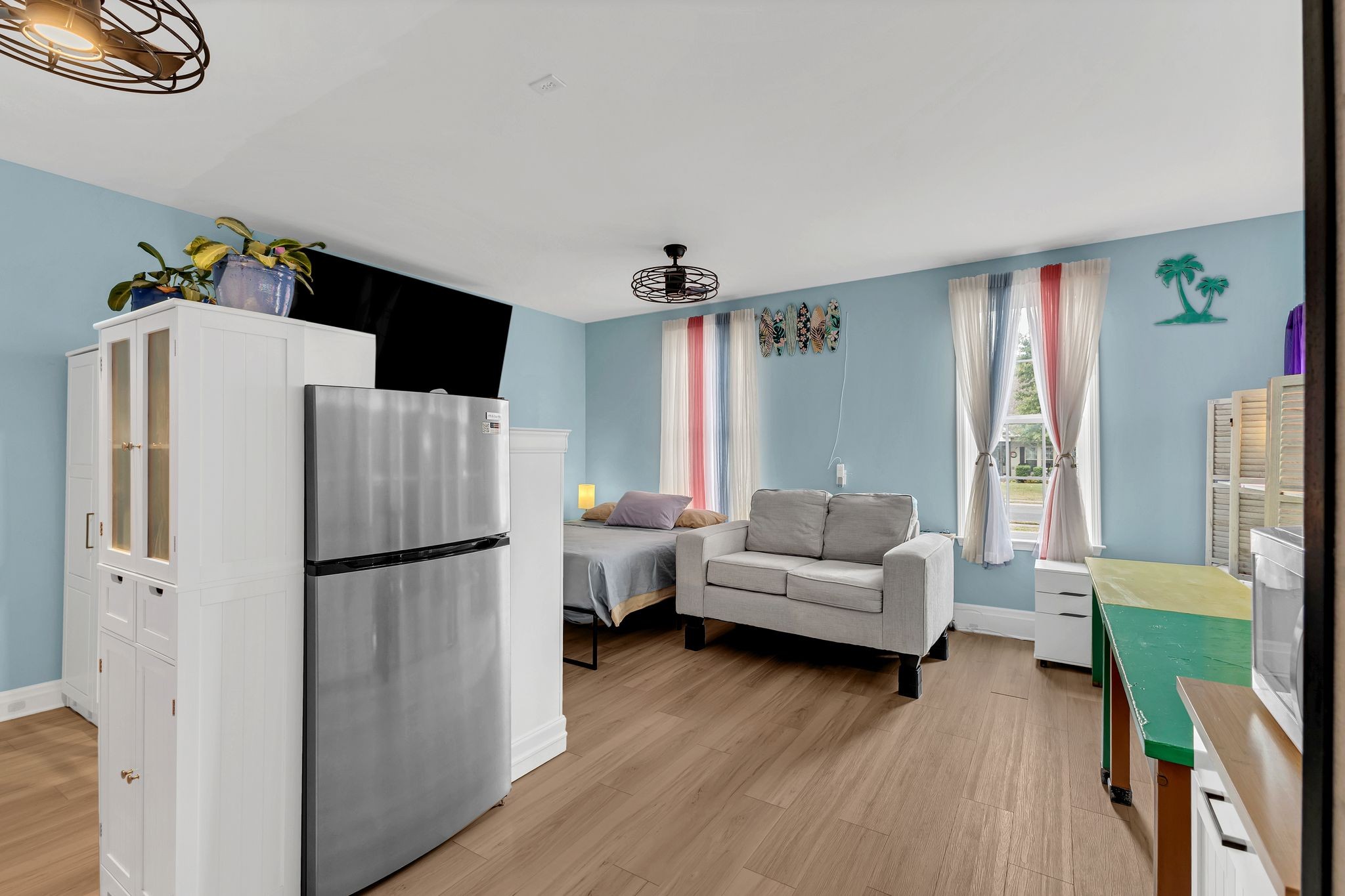 1726 Splash Place Murfreesboro, TN 37130 - Photo 19 of 42 a living room with furniture and a refrigerator