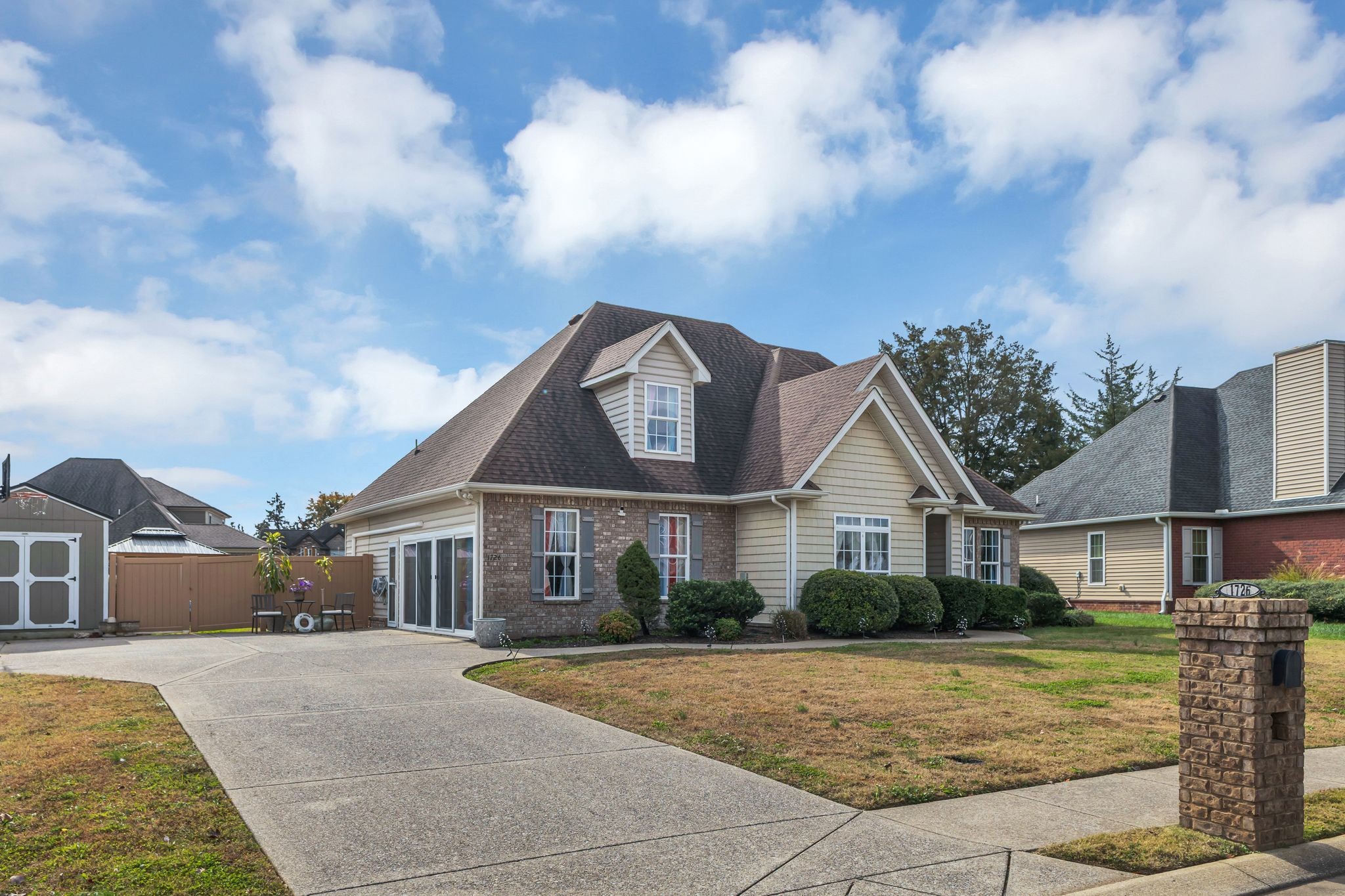 1726 Splash Place Murfreesboro, TN 37130 - Photo 35 of 42 a front view of a house with yard