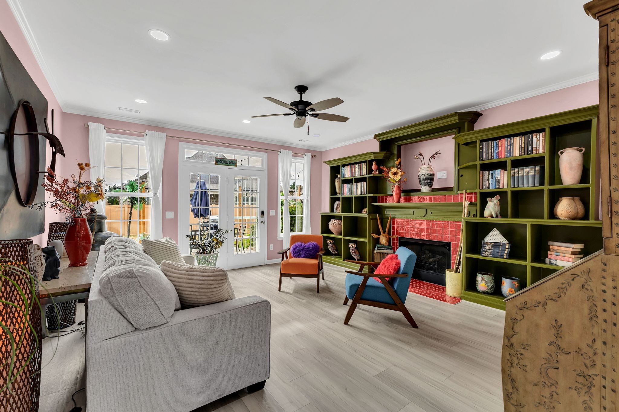 1726 Splash Place Murfreesboro, TN 37130 - Photo 5 of 42 a living room with furniture a bookshelf and a book shelf
