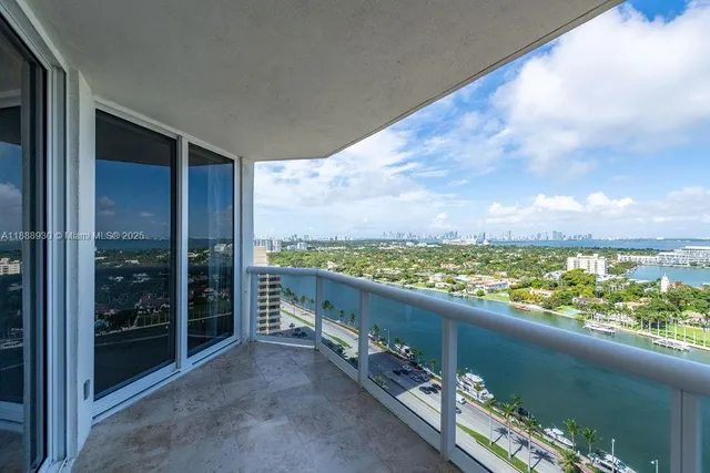 a view of balcony with city
