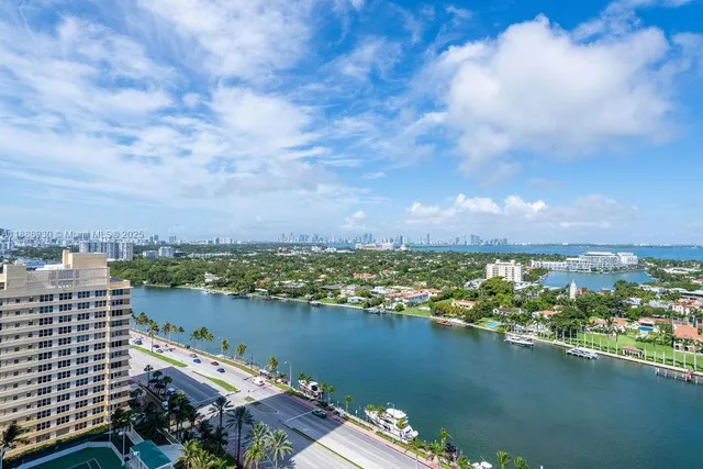 a view of a lake with a city