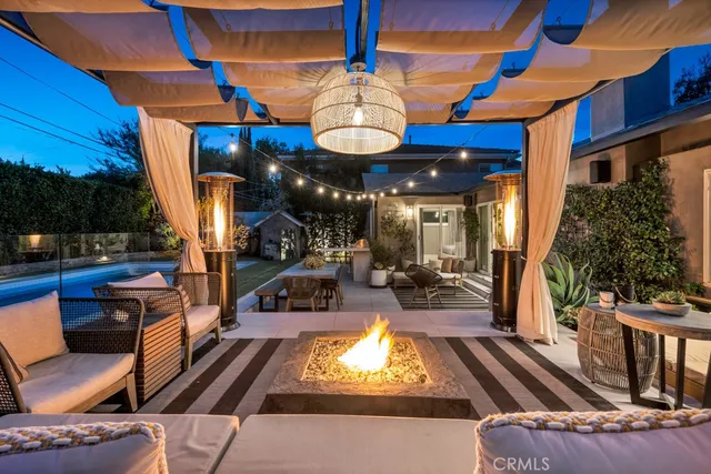 a view of a chairs and tables in patio