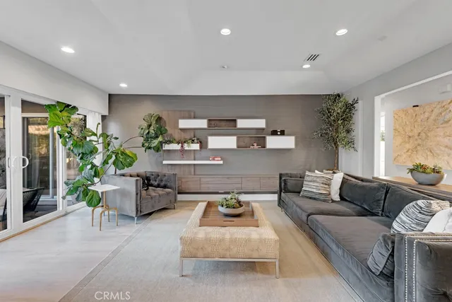 a living room with furniture and a couch