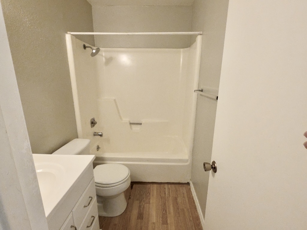 8508 Romney Road Austin, TX 78748 - Photo 16 of 21 a bathroom with a sink a toilet and shower