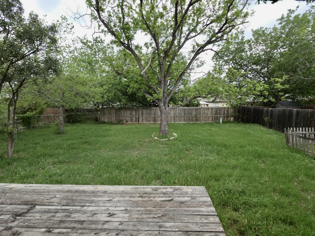 8508 Romney Road Austin, TX 78748 - Photo 20 of 21 a backyard of a house with lots of green space