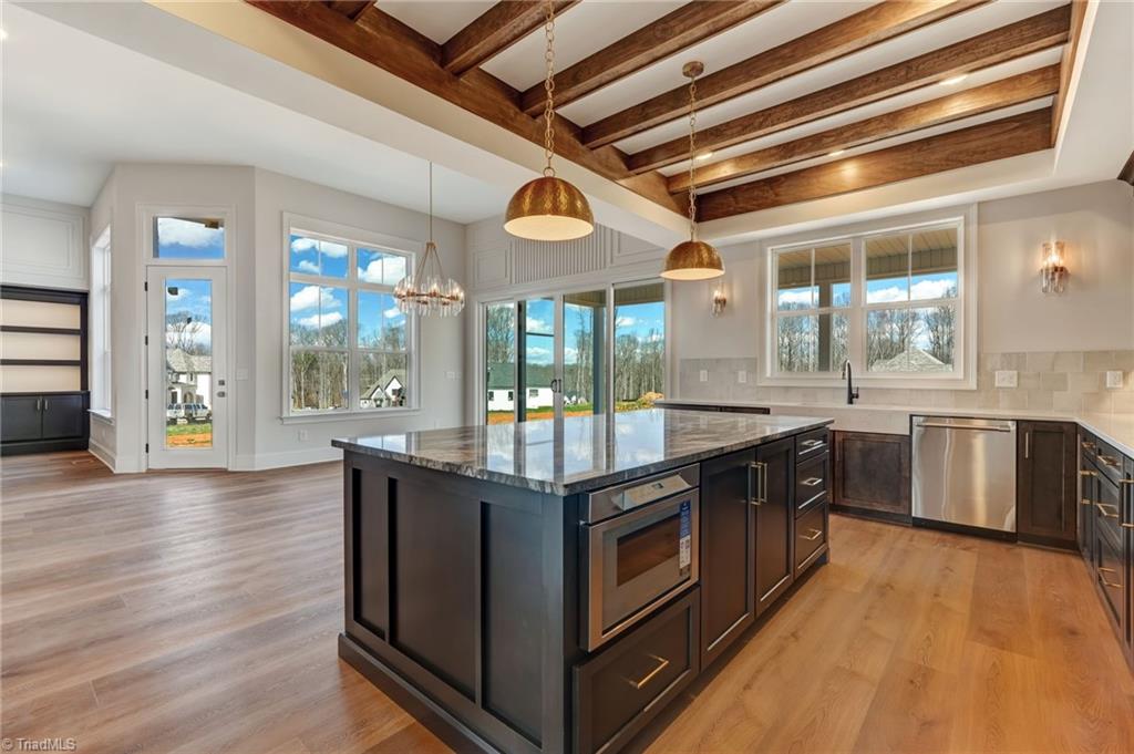 7688 Kyran Court Oak Ridge, NC 27310 - Photo 15 of 36 Corner of the kitchen looking into the dining room