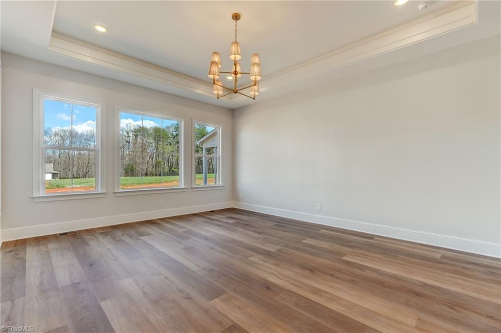 7688 Kyran Court Oak Ridge, NC 27310 - Photo 16 of 36 Additional views of primary bedroom