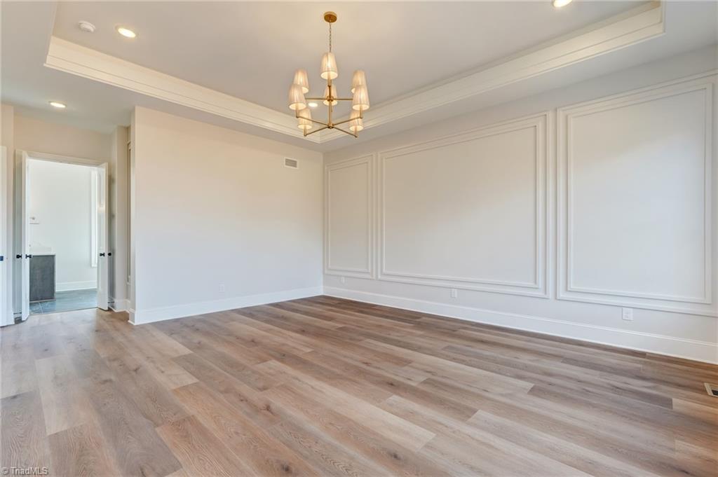 7688 Kyran Court Oak Ridge, NC 27310 - Photo 17 of 36 Additional views of primary bedroom