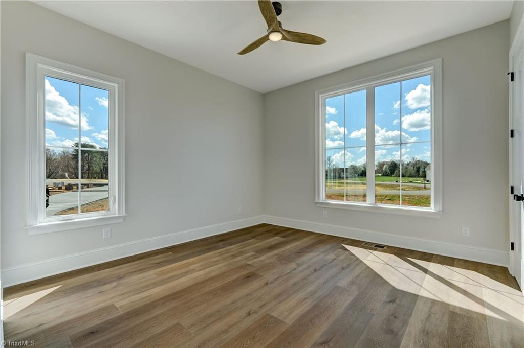 7688 Kyran Court Oak Ridge, NC 27310 - Photo 21 of 36 Main level guest suite