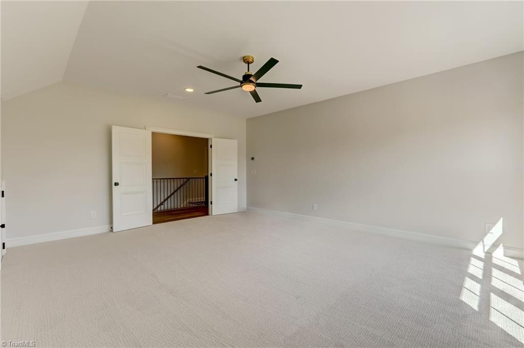 7688 Kyran Court Oak Ridge, NC 27310 - Photo 32 of 36 Expansive upstairs bonus room