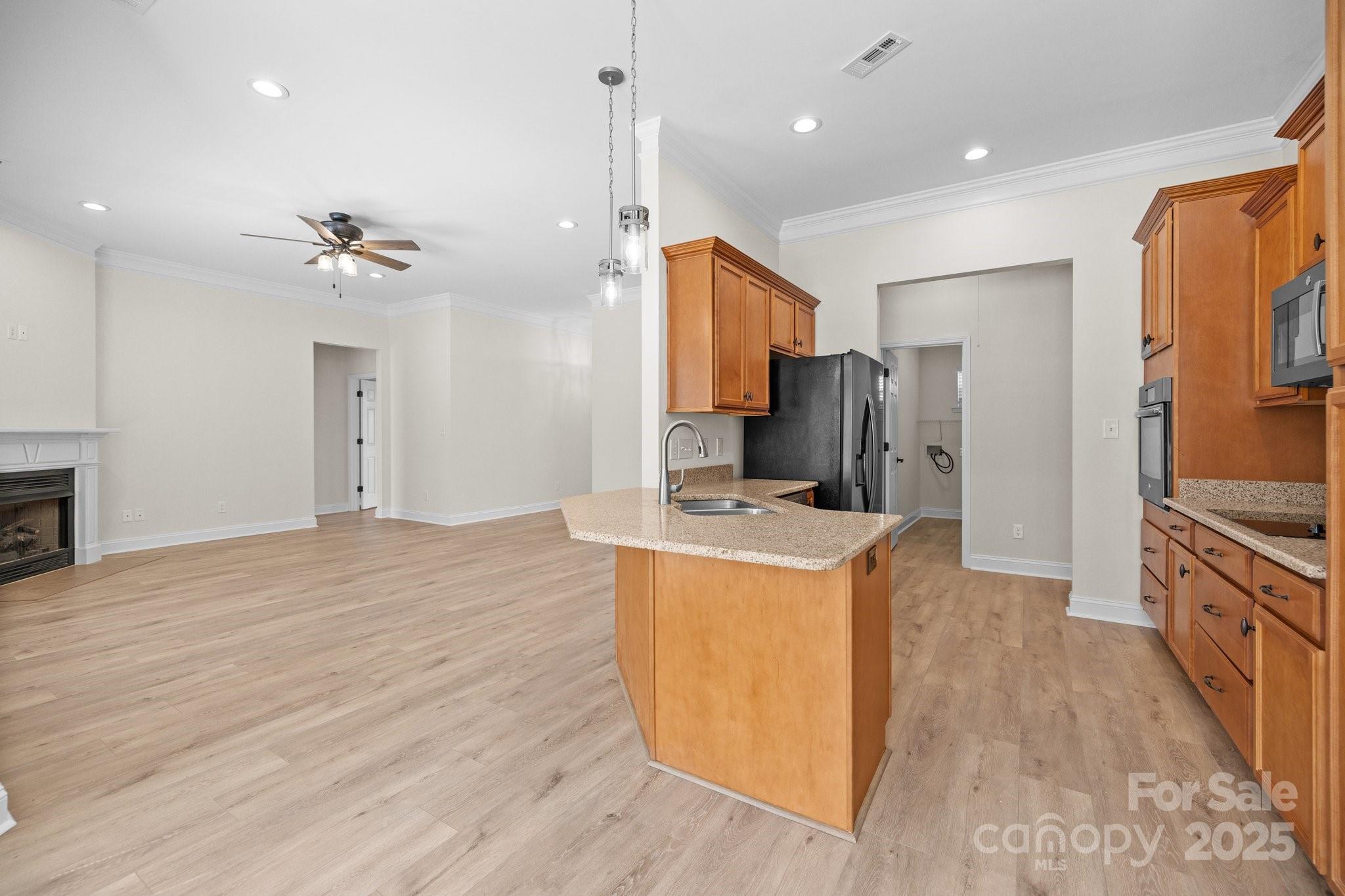 910 Pine Knoll Road, Unit 13 Fort Mill, SC 29715 - Photo 11 of 37 a kitchen with stainless steel appliances granite countertop a refrigerator a stove and a sink