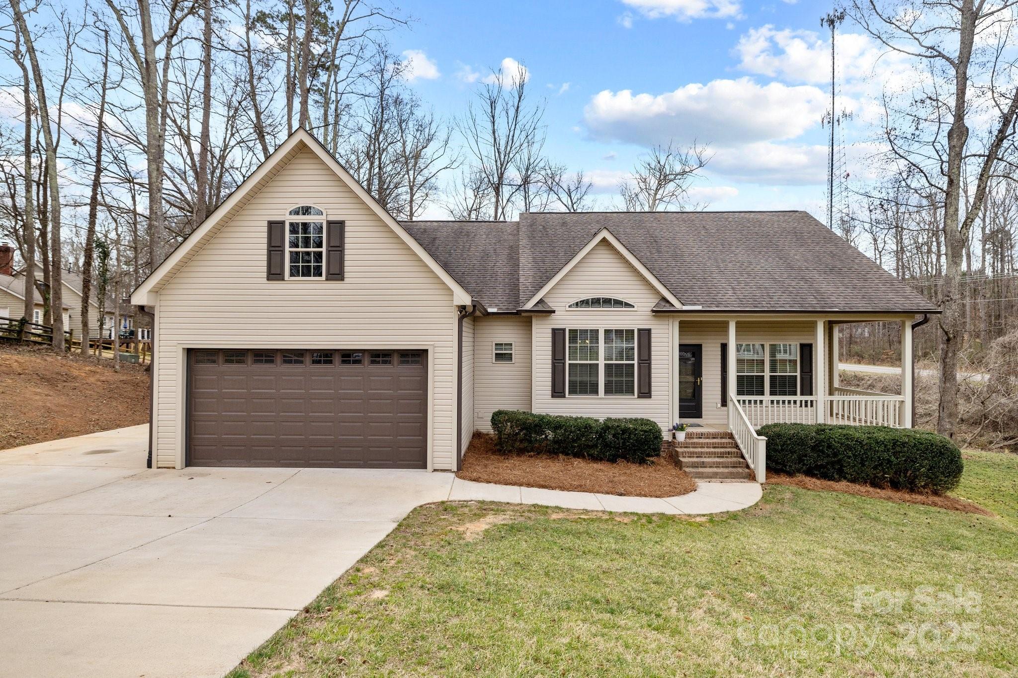 910 Pine Knoll Road, Unit 13 Fort Mill, SC 29715 - Photo 2 of 37 a view of a yard in front of house