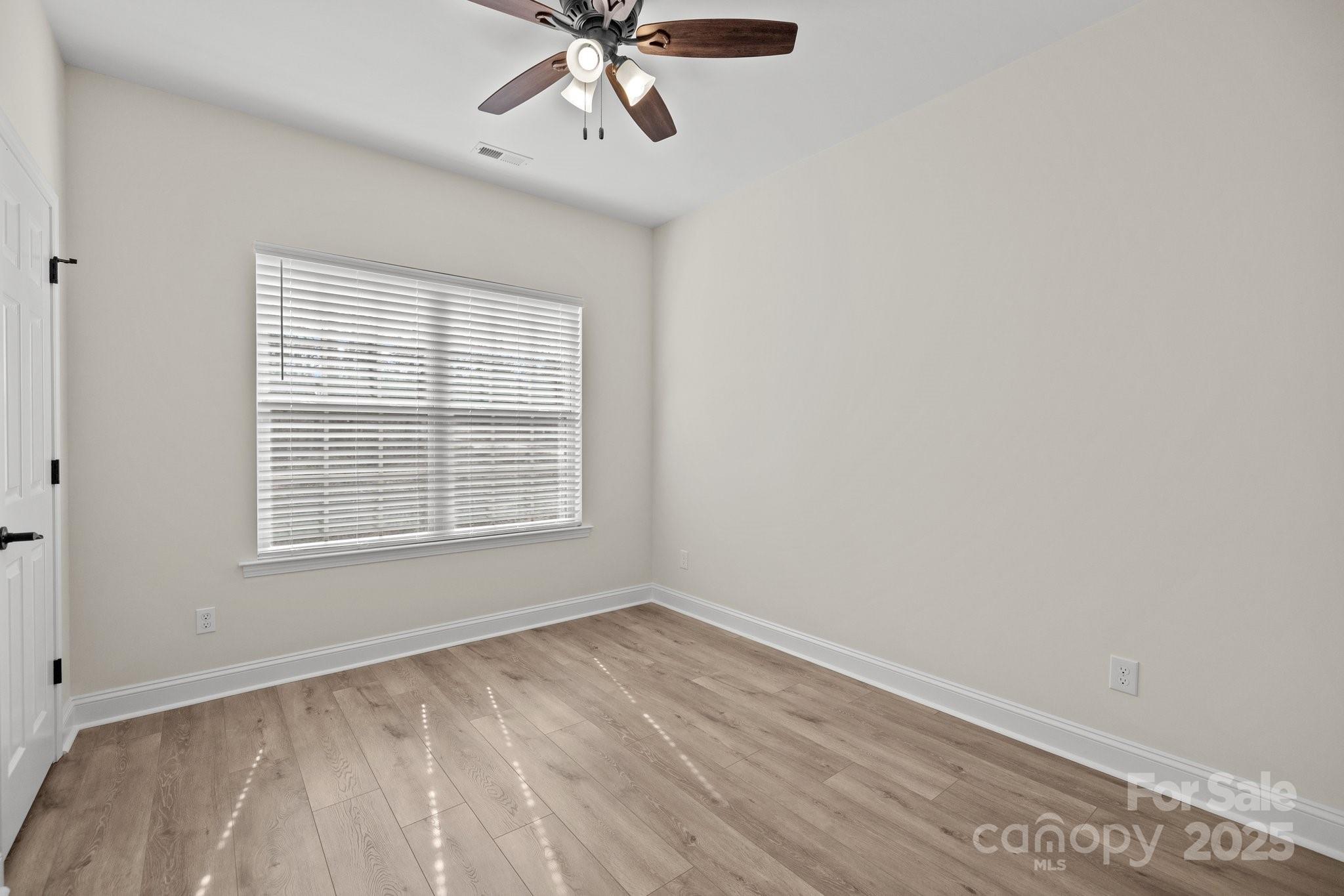 910 Pine Knoll Road, Unit 13 Fort Mill, SC 29715 - Photo 23 of 37 a view of an empty room with a window