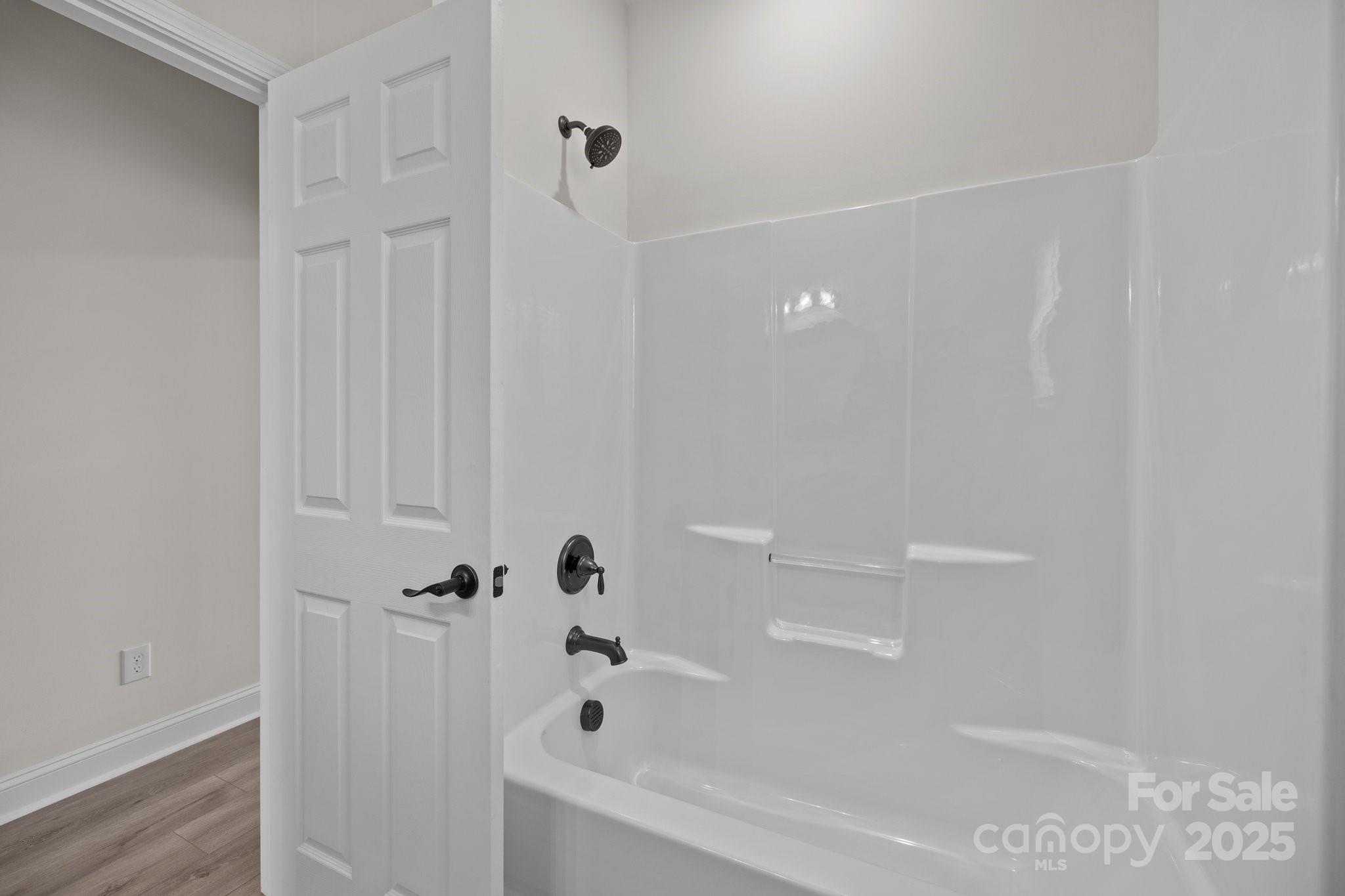 910 Pine Knoll Road, Unit 13 Fort Mill, SC 29715 - Photo 26 of 37 a bathroom with a bathtub