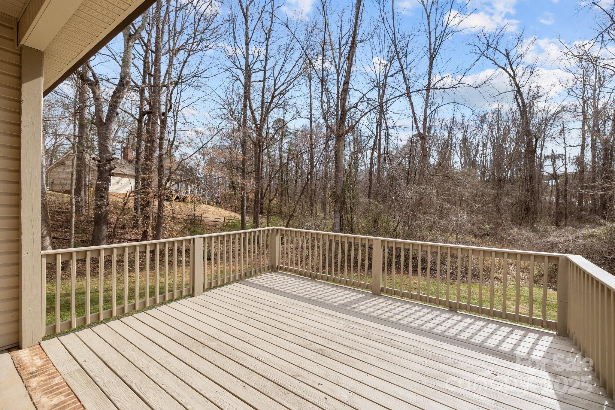 910 Pine Knoll Road, Unit 13 Fort Mill, SC 29715 - Photo 29 of 37 a view of balcony with wooden floor and fence
