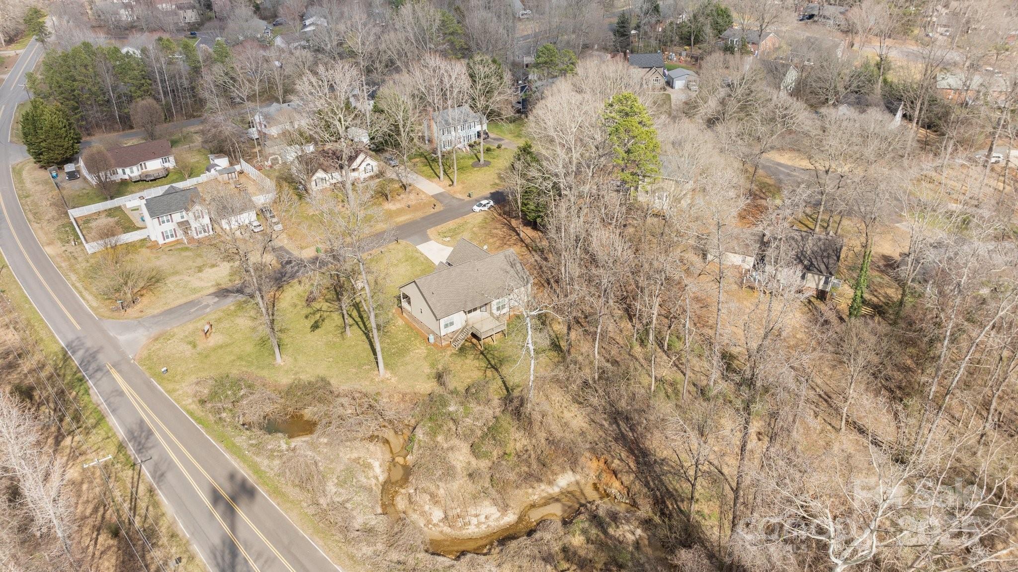 910 Pine Knoll Road, Unit 13 Fort Mill, SC 29715 - Photo 36 of 37 a view of a yard of the tree