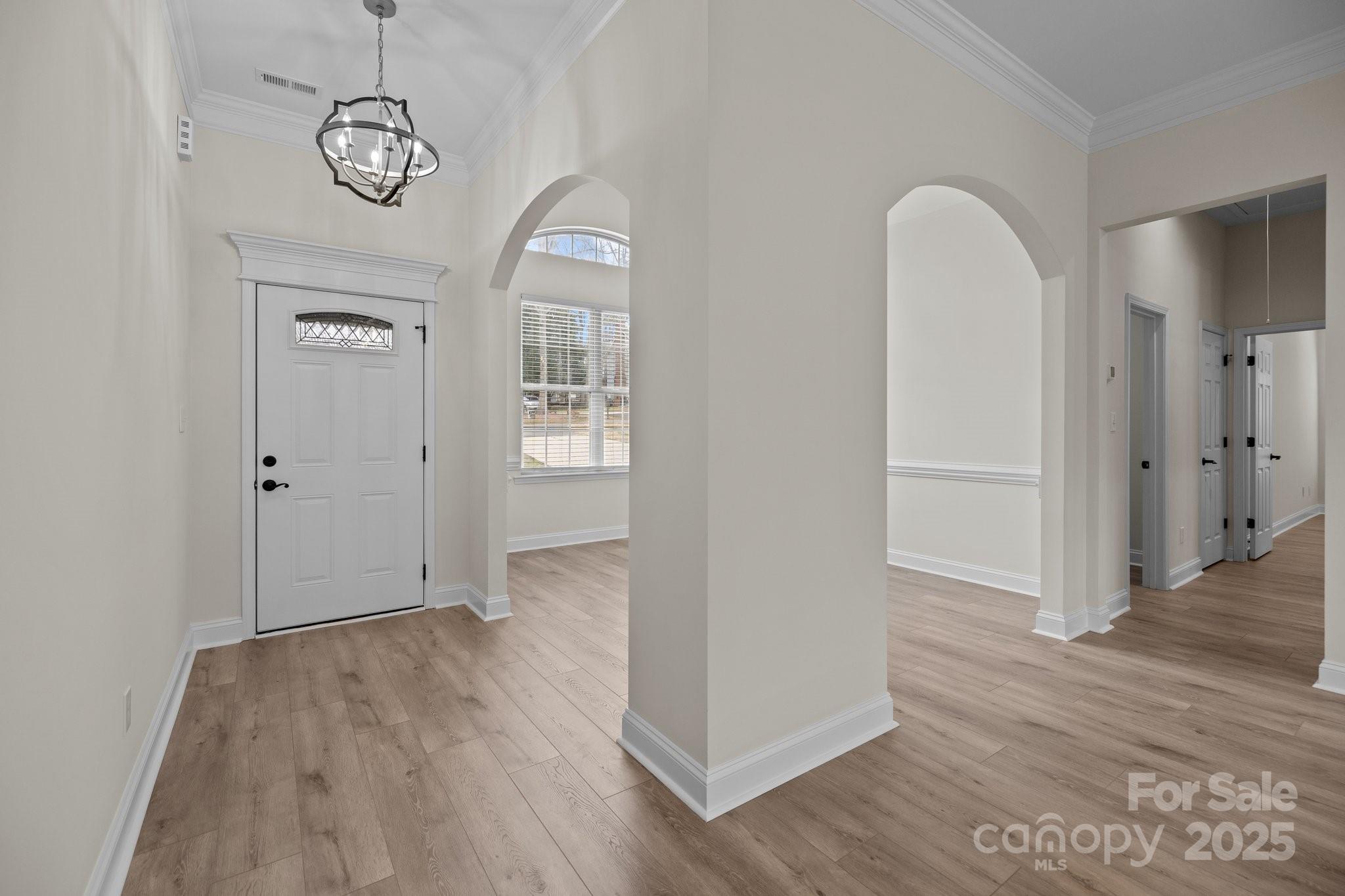 910 Pine Knoll Road, Unit 13 Fort Mill, SC 29715 - Photo 4 of 37 a view of empty room with wooden floor