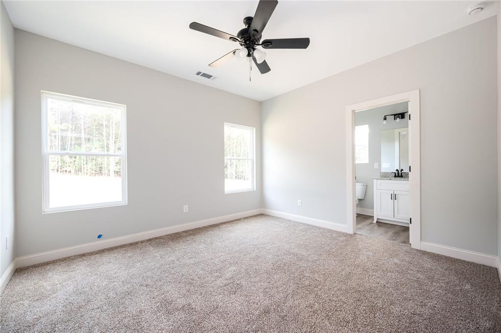 371 C W Sims Road Hiram, GA 30141 - Photo 9 of 12 a view of an empty room with a window