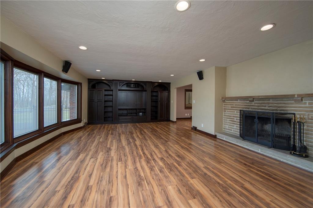 104 Woodridge Road Butler, PA 16001 - Photo 8 of 25 Living Room with custom built in entertainment center.
