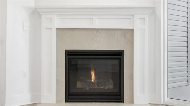 a living room with a fireplace