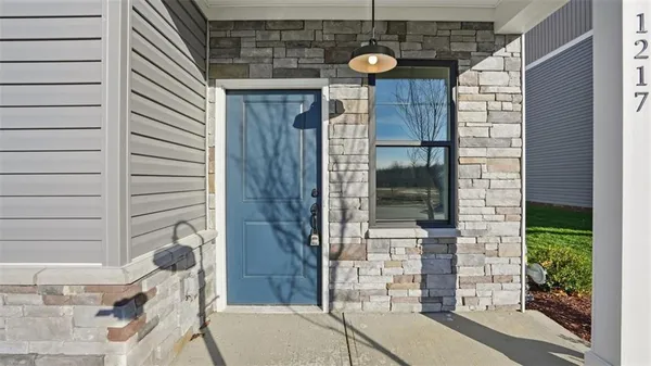 a view of a door and outdoor space