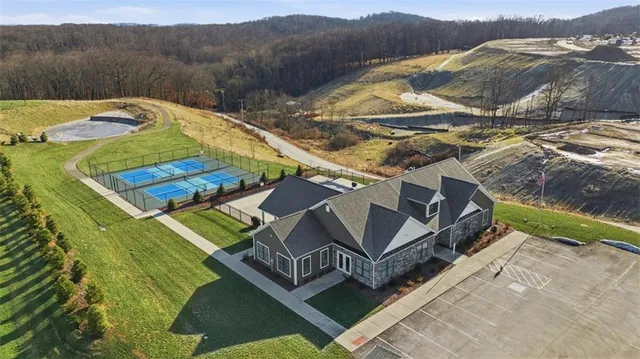 a view of a pool with a yard