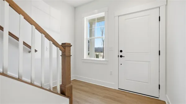 a view of front door with hallway