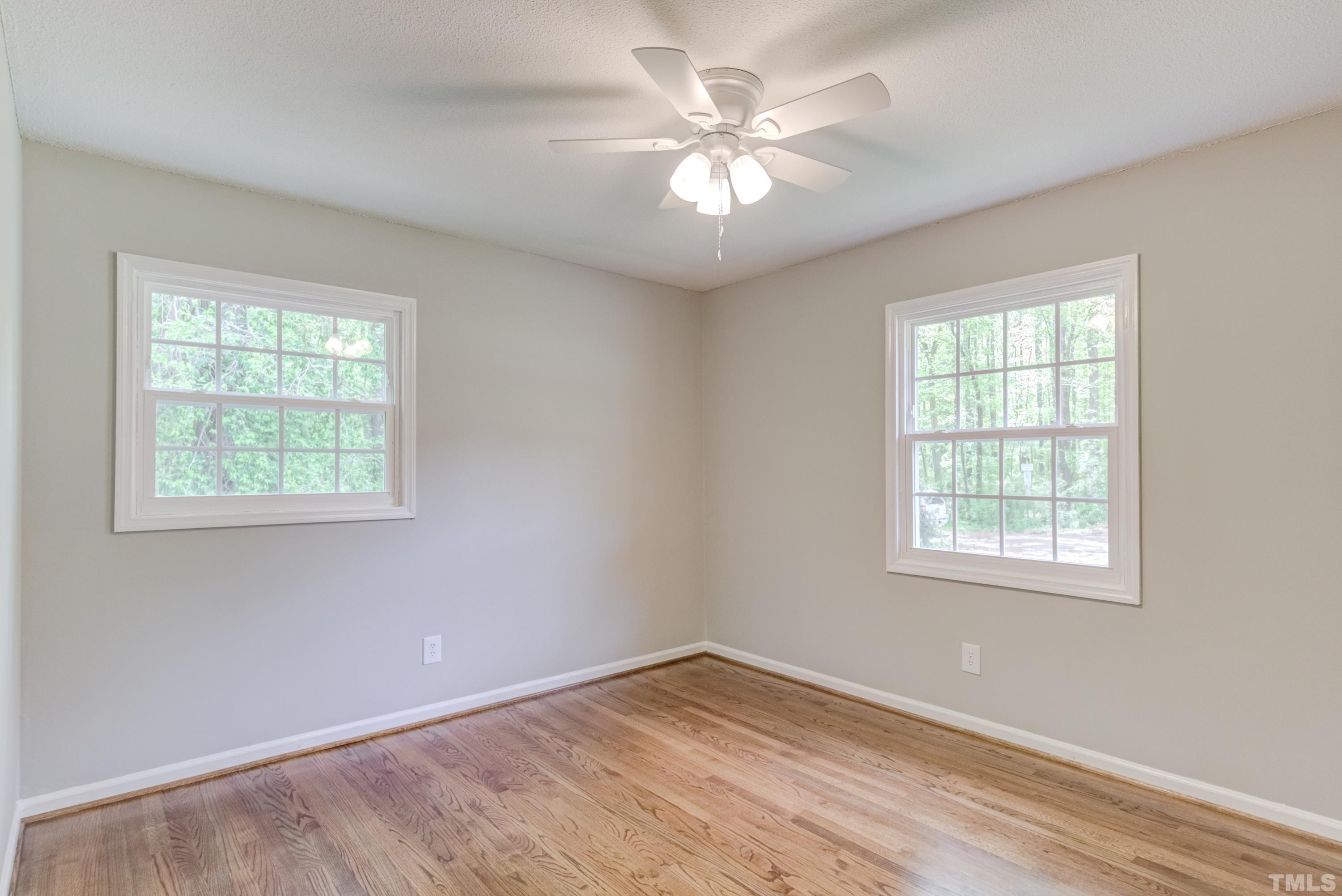 6005 Meadowbrook Road Raleigh, NC 27603 - Photo 17 of 42 an empty room with a window
