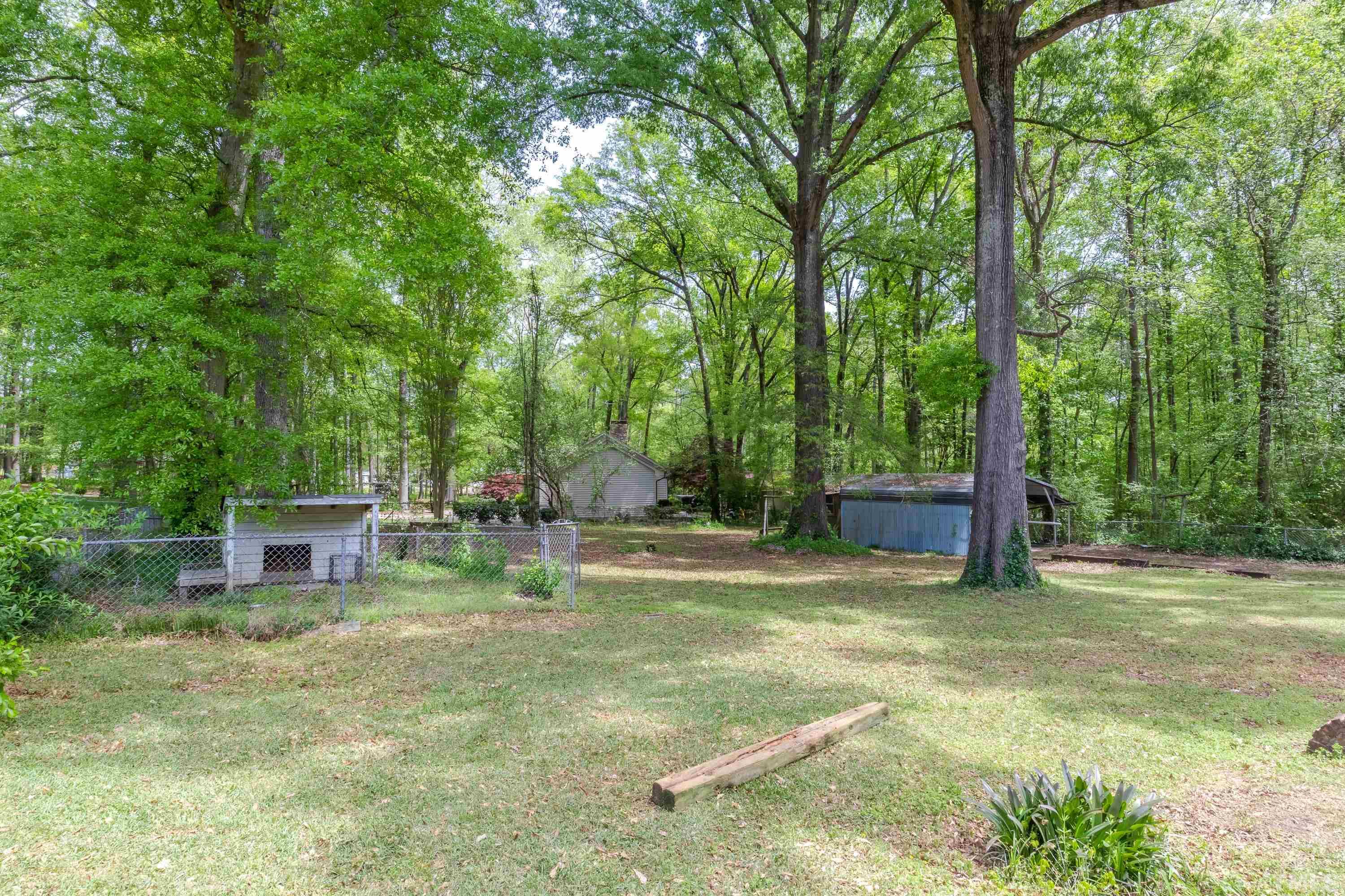 6005 Meadowbrook Road Raleigh, NC 27603 - Photo 30 of 42 a view of a backyard with sitting area