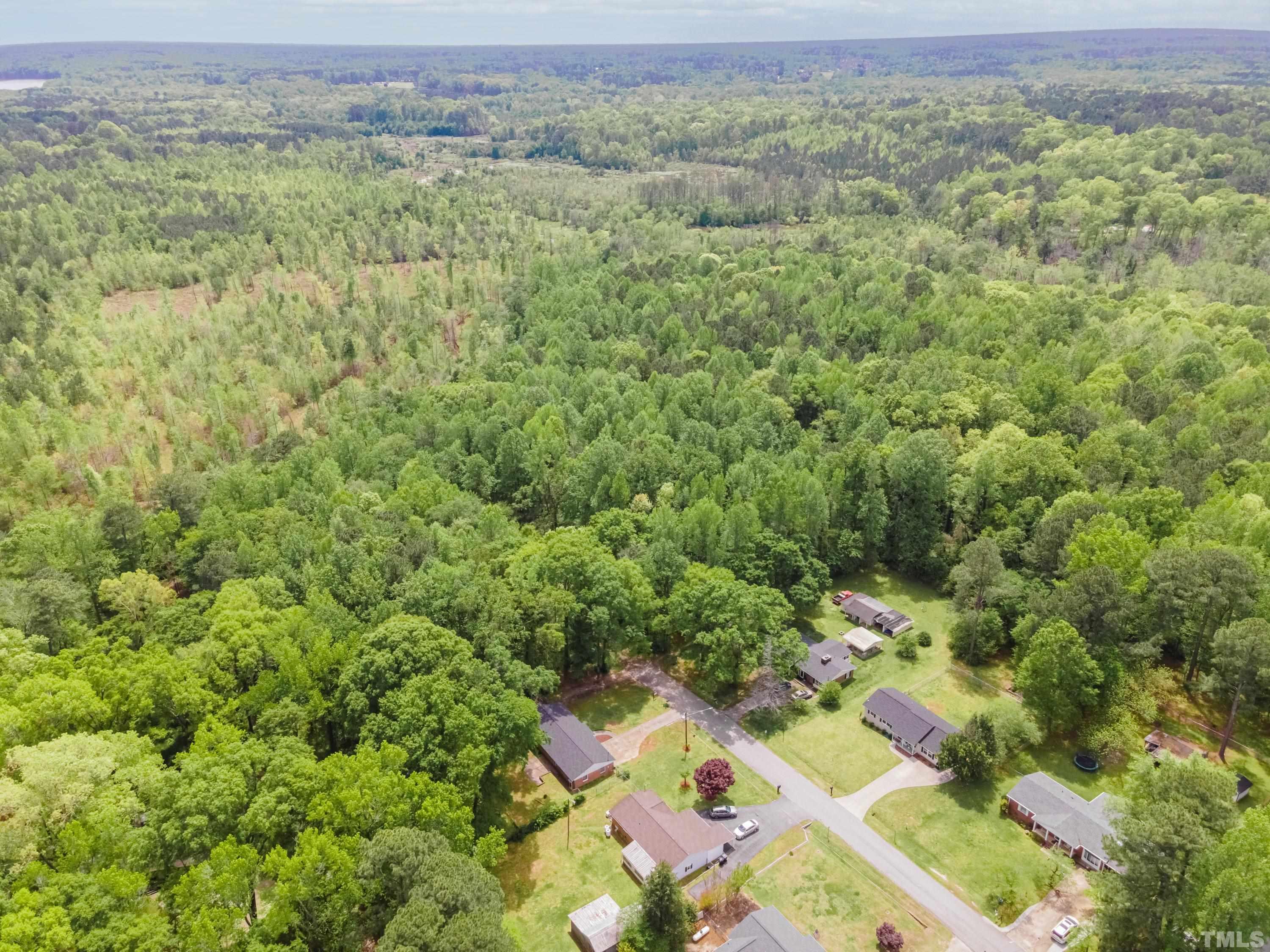 6005 Meadowbrook Road Raleigh, NC 27603 - Photo 41 of 42 an aerial view of residential houses with outdoor space