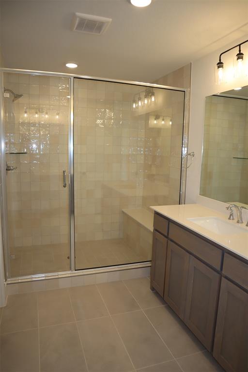 205 Chestnut Celina, TX 75009 - Photo 13 of 19 a bathroom with a shower and a sink