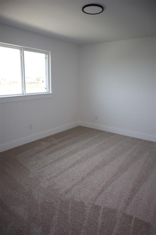 205 Chestnut Celina, TX 75009 - Photo 17 of 19 an empty room with a window
