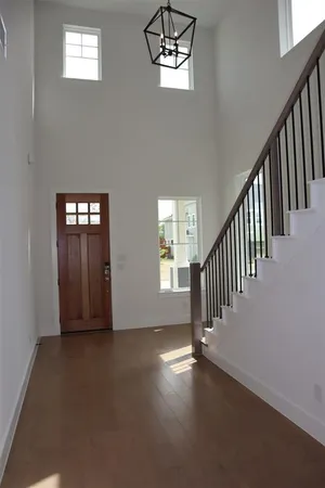 a view of a hallway with windows
