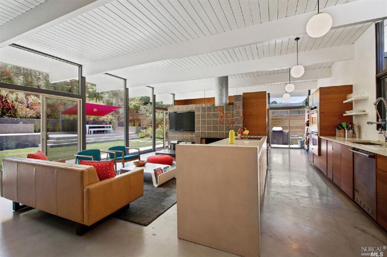 761 Montecillo Road San Rafael, CA 94903 - Photo 1 of 1 a living room with fireplace furniture and a kitchen