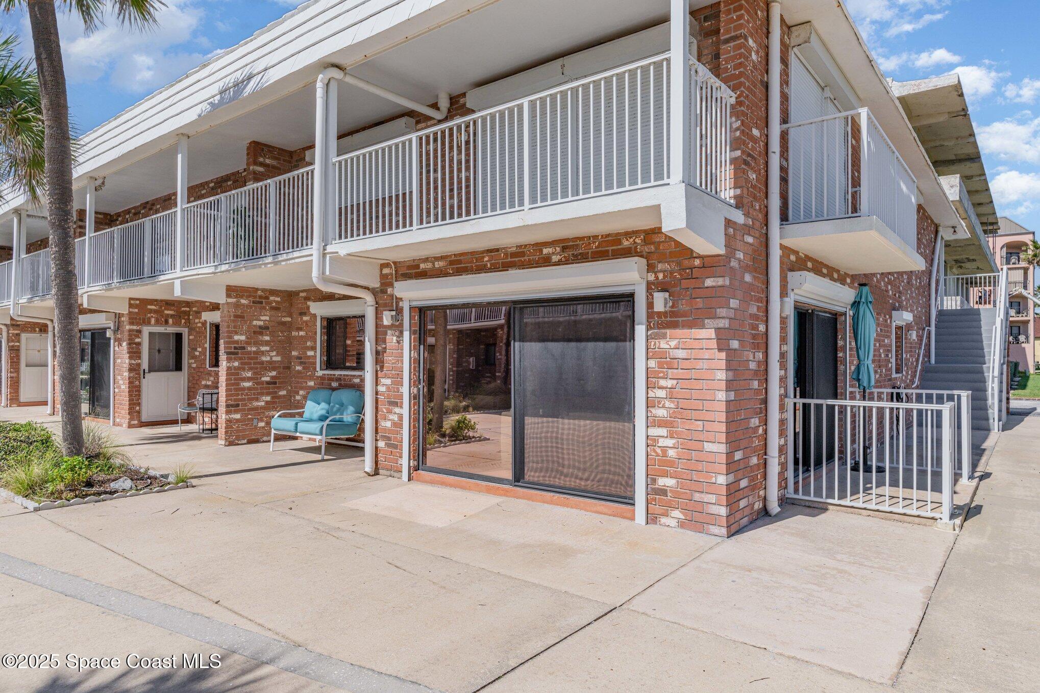 5000 Ocean Beach Boulevard, Unit C5 Cocoa Beach, FL 32931 - Photo 2 of 31 front view of a building