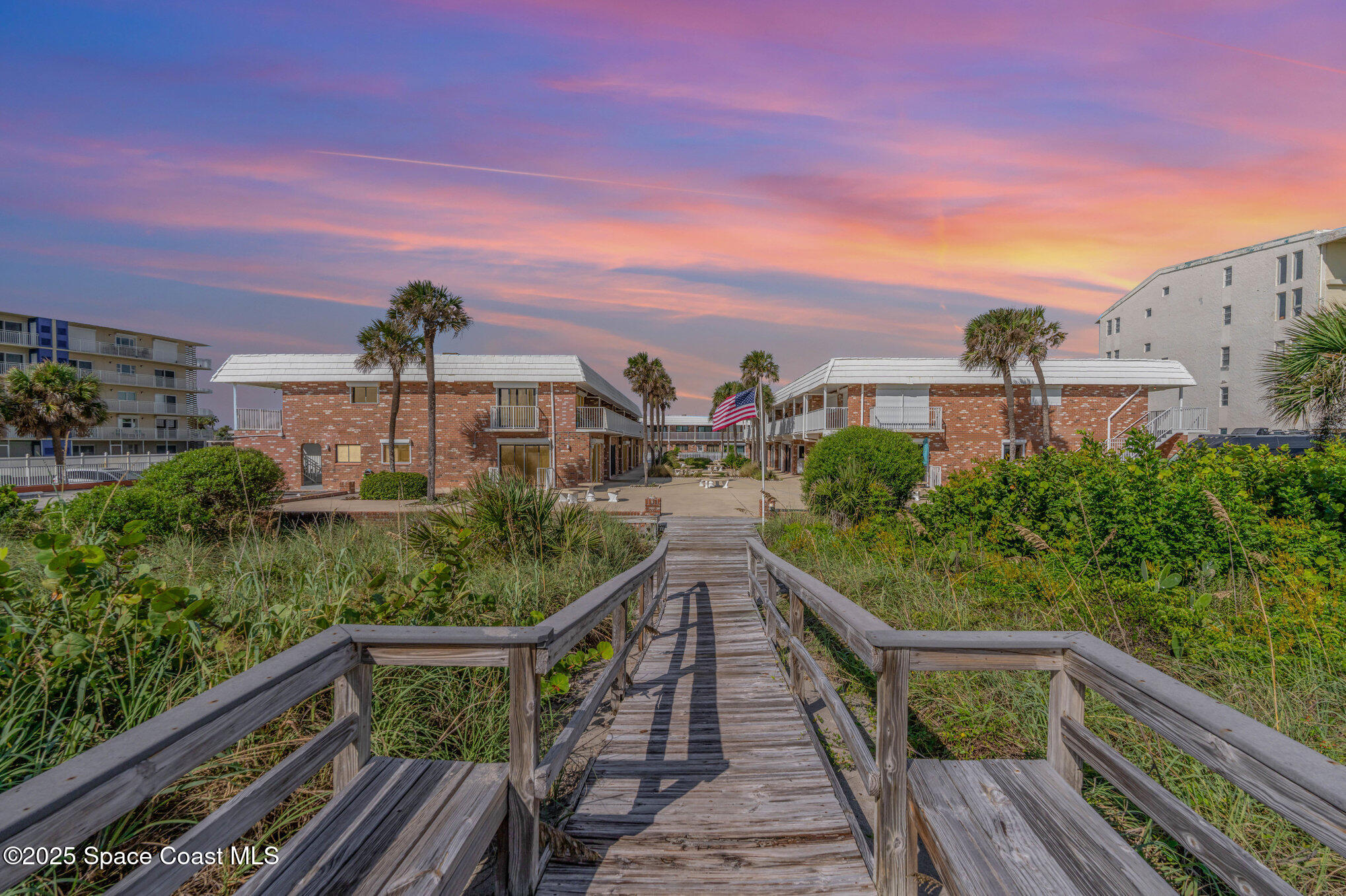 5000 Ocean Beach Boulevard, Unit C5 Cocoa Beach, FL 32931 - Photo 27 of 31 a view of a balcony with an outdoor space