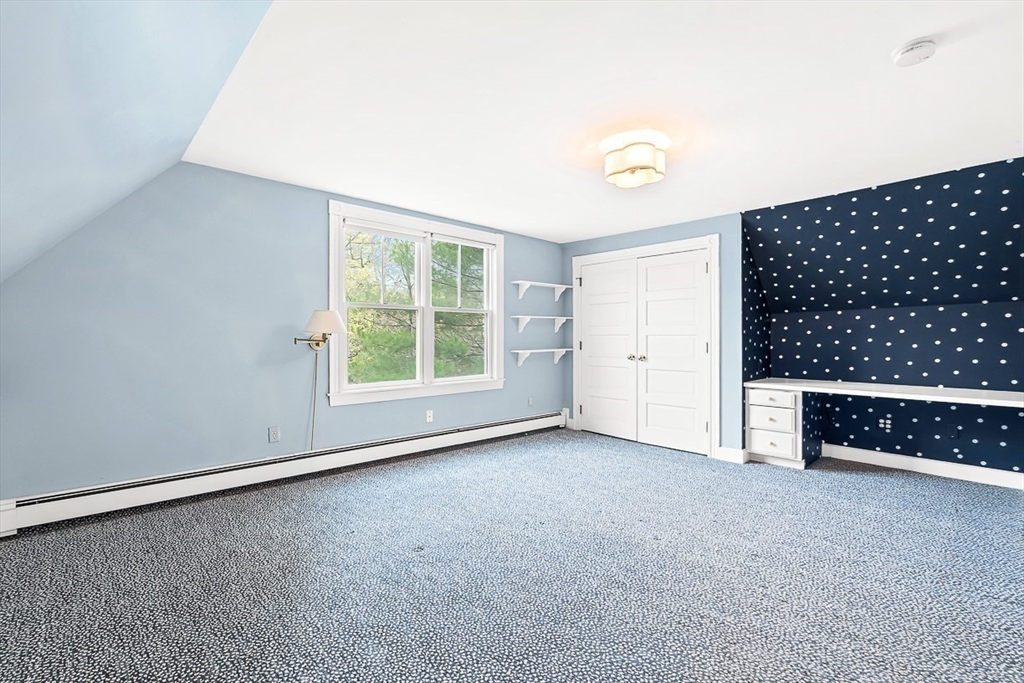 207 Weston Road Wellesley, MA 02482 - Photo 21 of 23 an empty room with a window