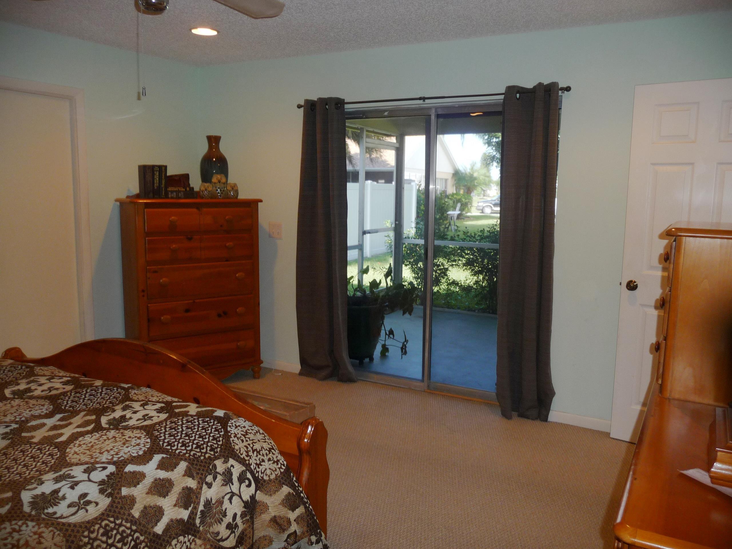 120 Raintree Trail Jupiter, FL 33458 - Photo 15 of 28 Master bedroom