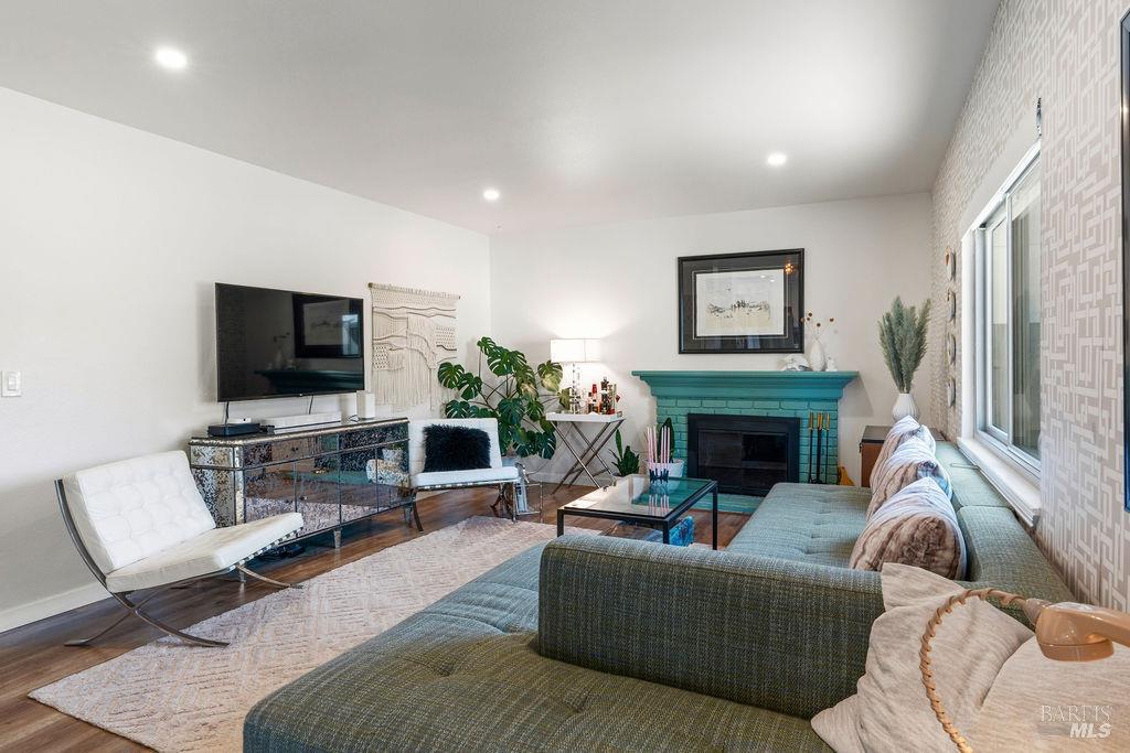 8633 Lancaster Drive Rohnert Park, CA 94928 - Photo 13 of 67 Wood burning fireplace in step down family room off the kitchen.