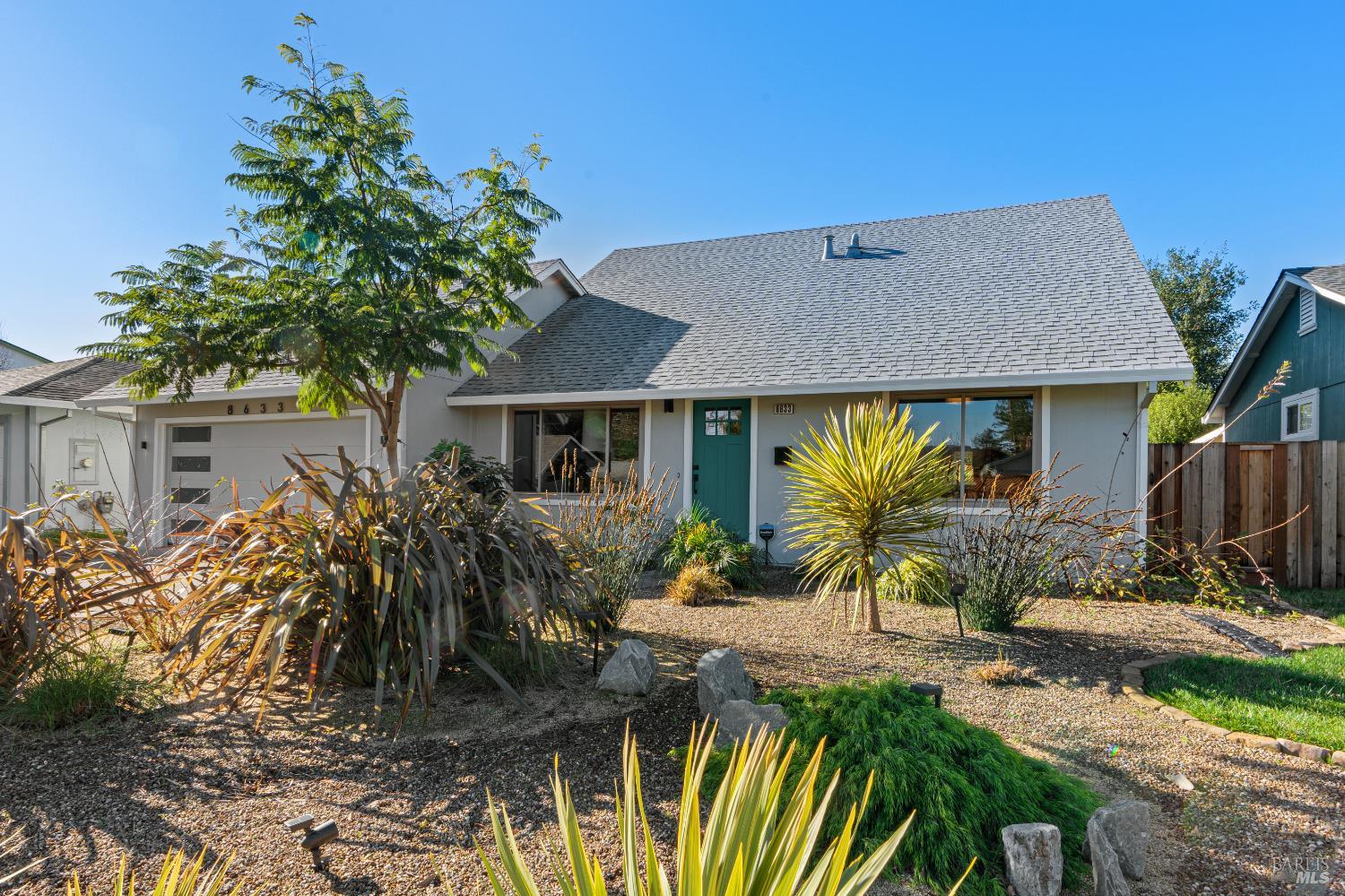 8633 Lancaster Drive Rohnert Park, CA 94928 - Photo 21 of 66 a front view of house with a garden