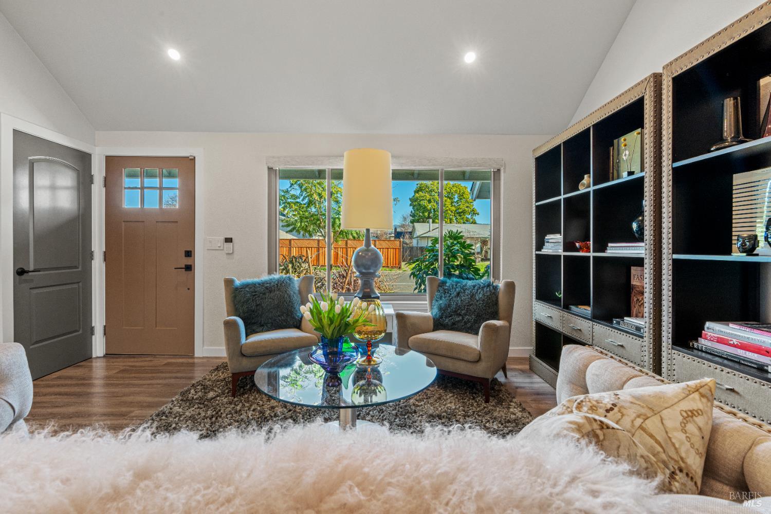 8633 Lancaster Drive Rohnert Park, CA 94928 - Photo 26 of 66 a living room with furniture and a book shelf