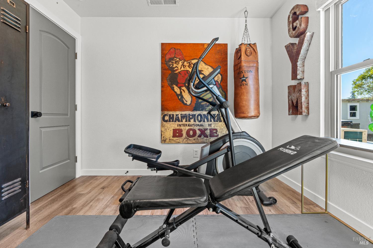 8633 Lancaster Drive Rohnert Park, CA 94928 - Photo 28 of 66 a room with gym equipment and view of a window