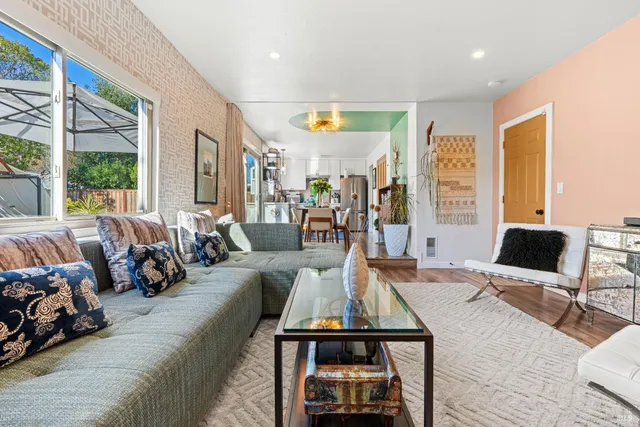 a bedroom with a bed and lamp on table