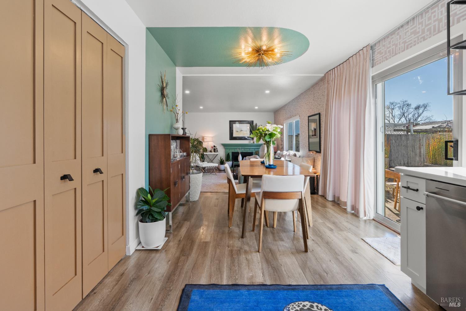 8633 Lancaster Drive Rohnert Park, CA 94928 - Photo 36 of 66 a view of a dining room with furniture and wooden floor
