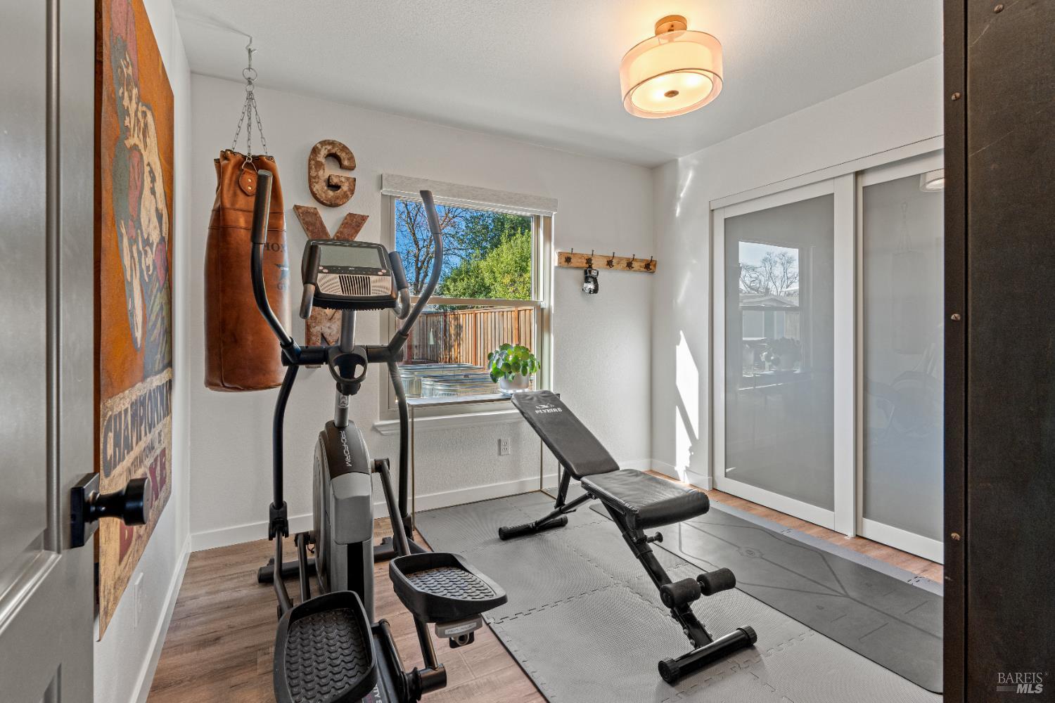 8633 Lancaster Drive Rohnert Park, CA 94928 - Photo 5 of 66 2nd bedroom on main floor used as home gym updated windows and LVL floors throughout.