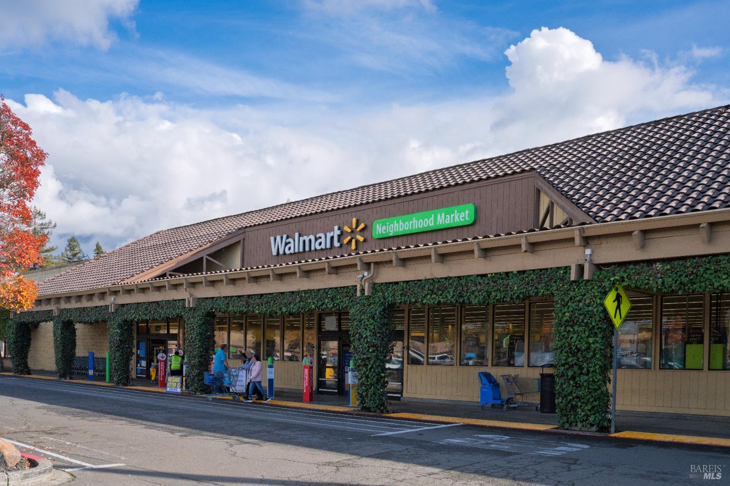 8633 Lancaster Drive Rohnert Park, CA 94928 - Photo 64 of 66 a view of a store with a lot of people on a street