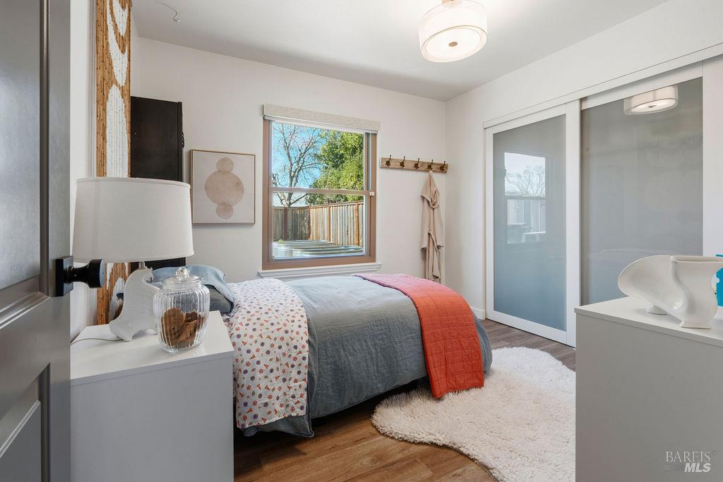 8633 Lancaster Drive Rohnert Park, CA 94928 - Photo 10 of 67 Sunny bedroom overlooking the backyard through energy-efficient window with modern window coverings throughout.