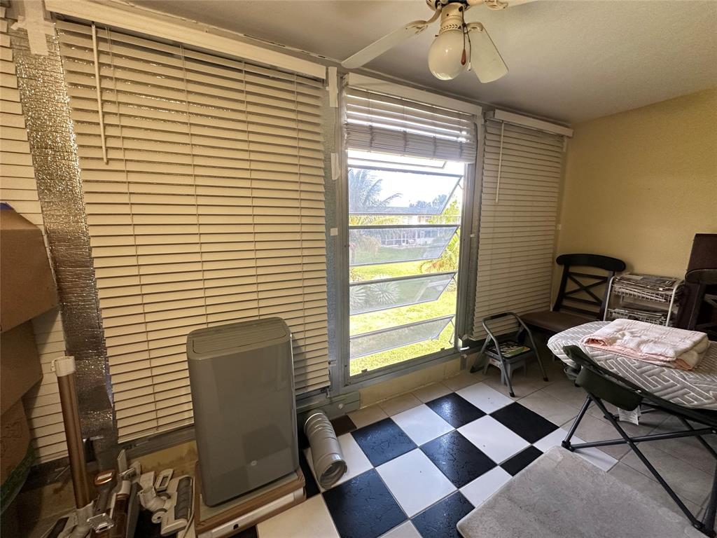 84 Farnham East, Unit 84 Deerfield Beach, FL 33442 - Photo 19 of 57 a view of a workspace with a window