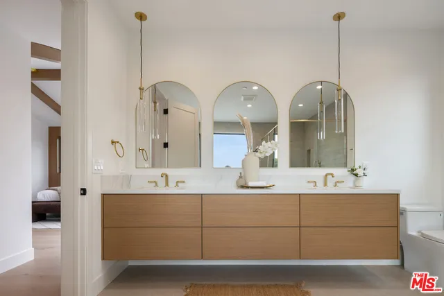 a bathroom with a toilet sink and bathtub