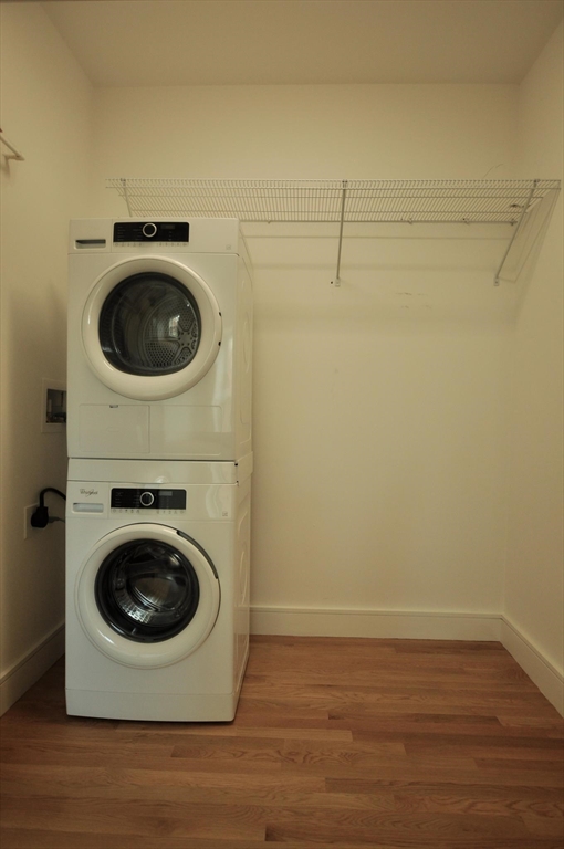 877 Beacon Street, Unit 7 Boston, MA 02215 - Photo 5 of 7 a utility room with dryer and washer